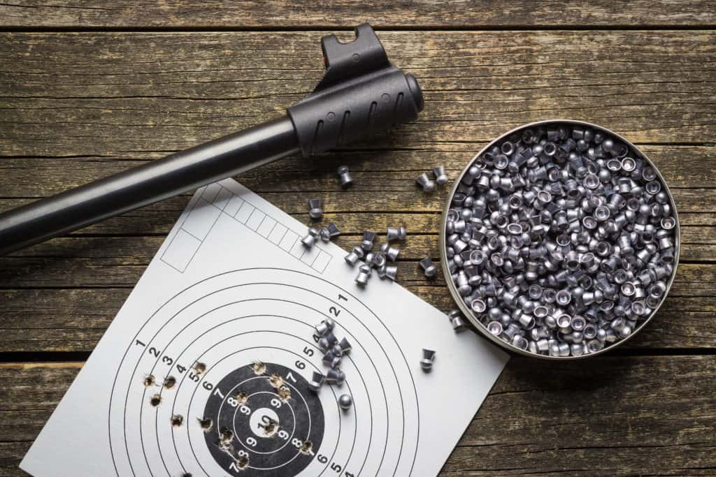 air rifle with pointed pellets with a target. 