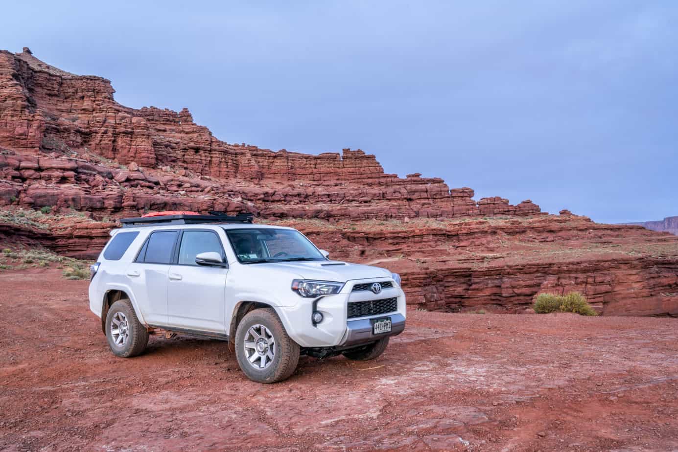 Moab , UT, USA - May 6, 2018: Toyota 4runner SUV (2016 trail edition, stock vehicle without any off road modifacations)) on a desert trail before sunrise in the Moab area.
